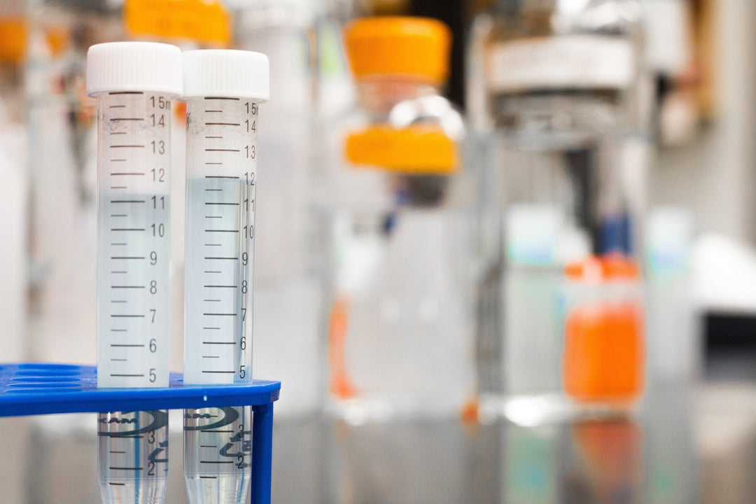 Two graduated tubes in a lab